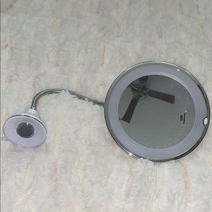 NuBrilliance suction 10x magnifying lighted mirror
